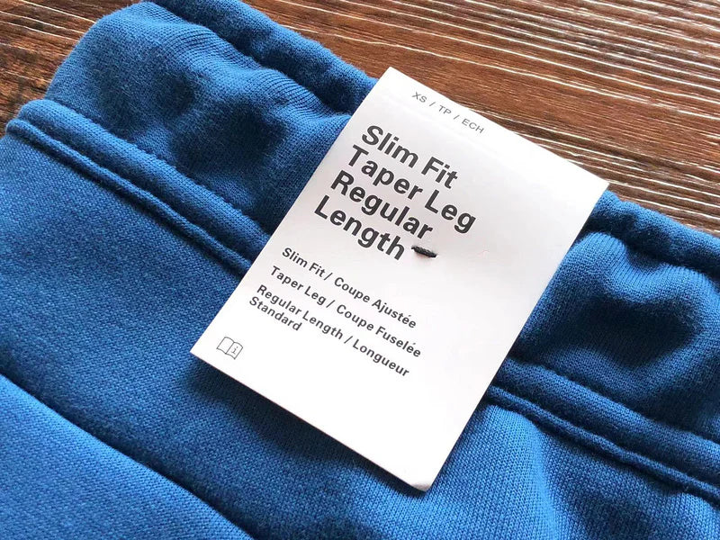 PANTALON NIKE TECH FLEECE x BLEU BLANC
