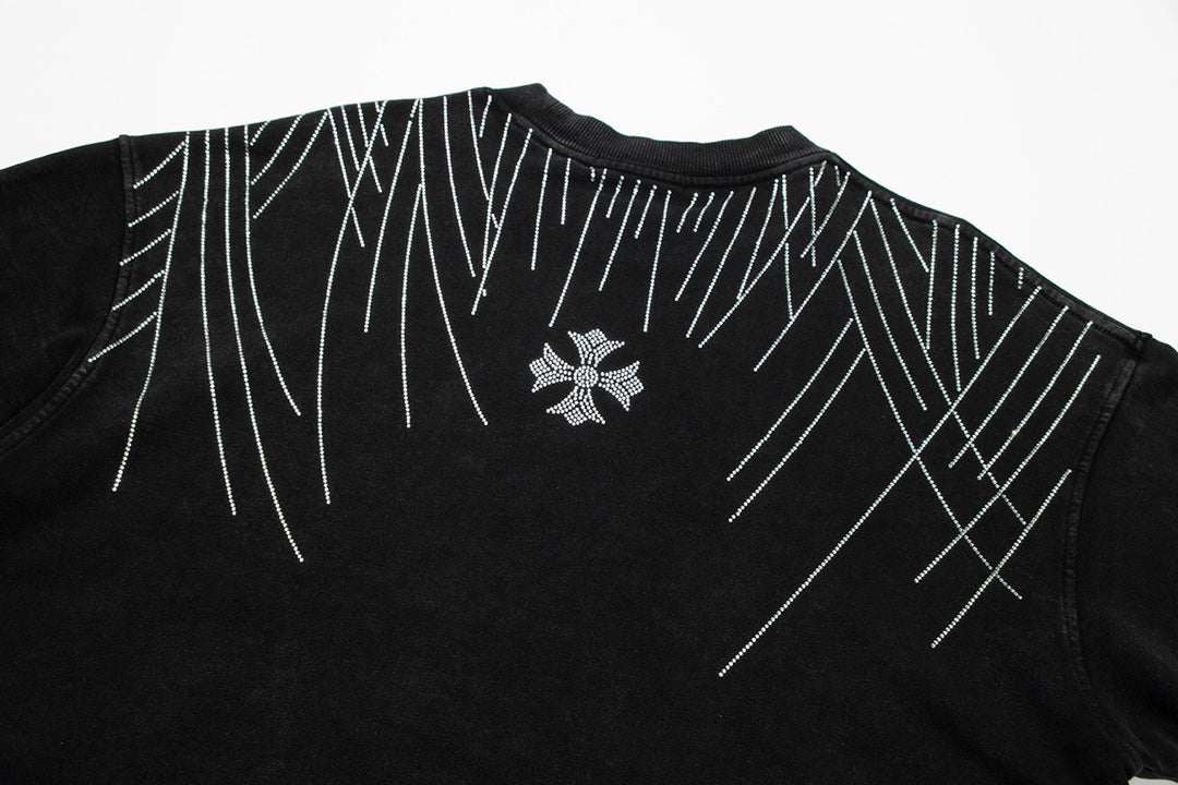 Sweat-shirt noir à motif cœurs chromés et strass