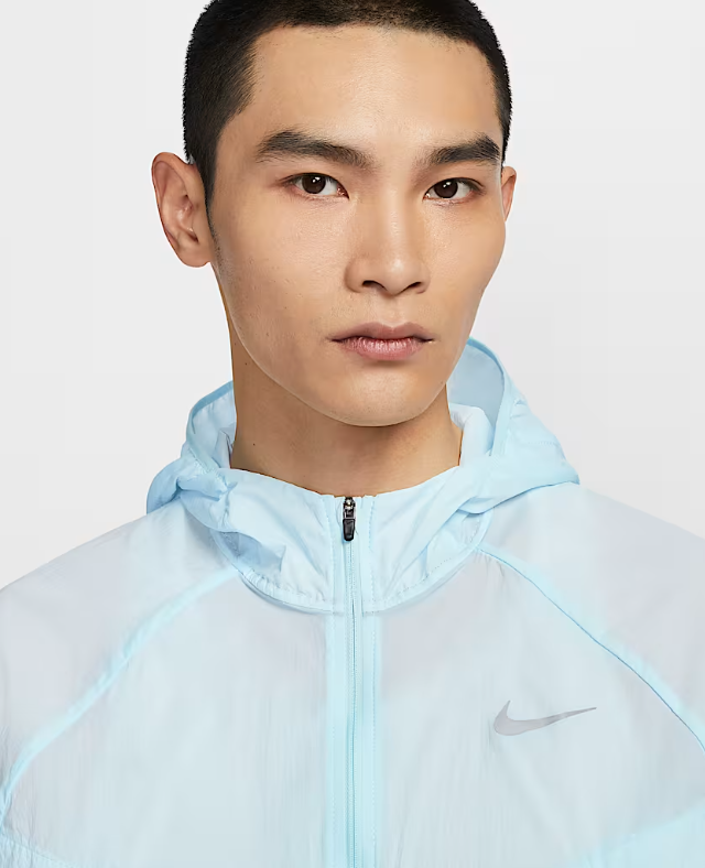 VESTE NIKE IMPERMEABLE BLEU CLAIR