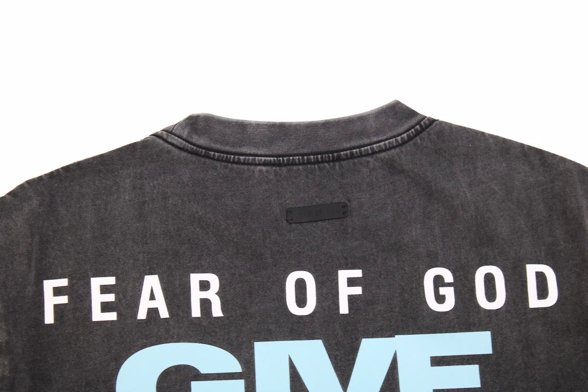 T-shirt « Fear of God » avec le texte « Give It Up »