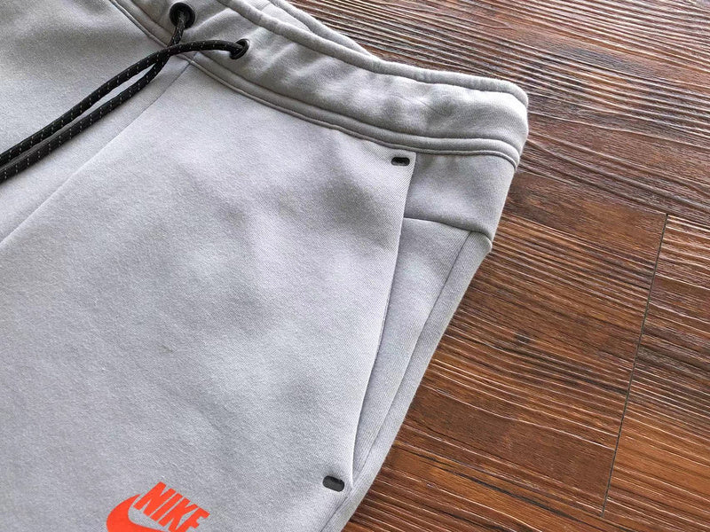 PANTALON NIKE TECH FLEECE x GRIS LOUP/AIGUE-MARINE/ORANGE