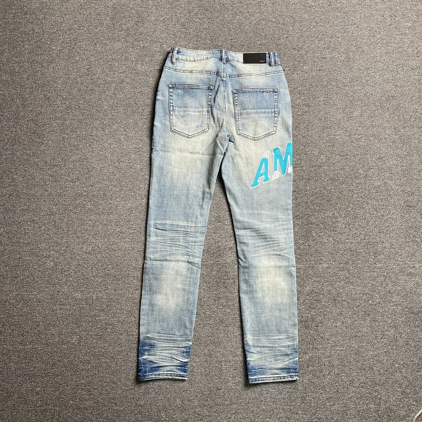JEAN AMIRI VARSITY