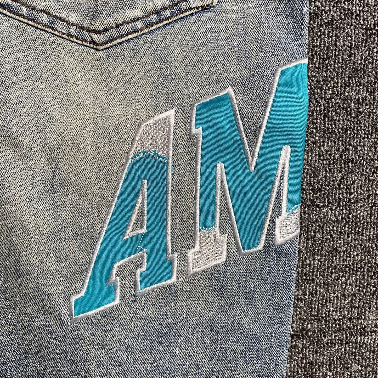 JEAN AMIRI VARSITY