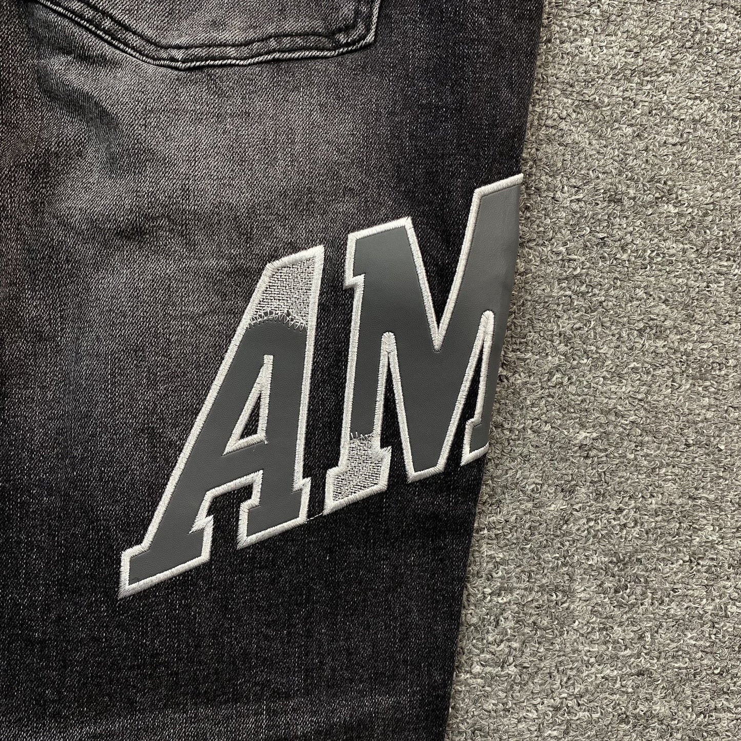 JEAN NOIR AMIRI VARSITY