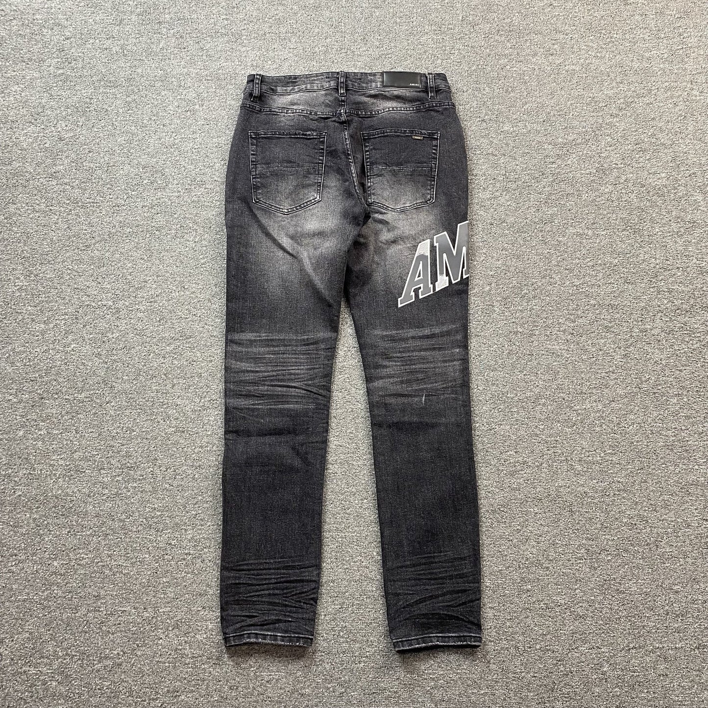 JEAN NOIR AMIRI VARSITY