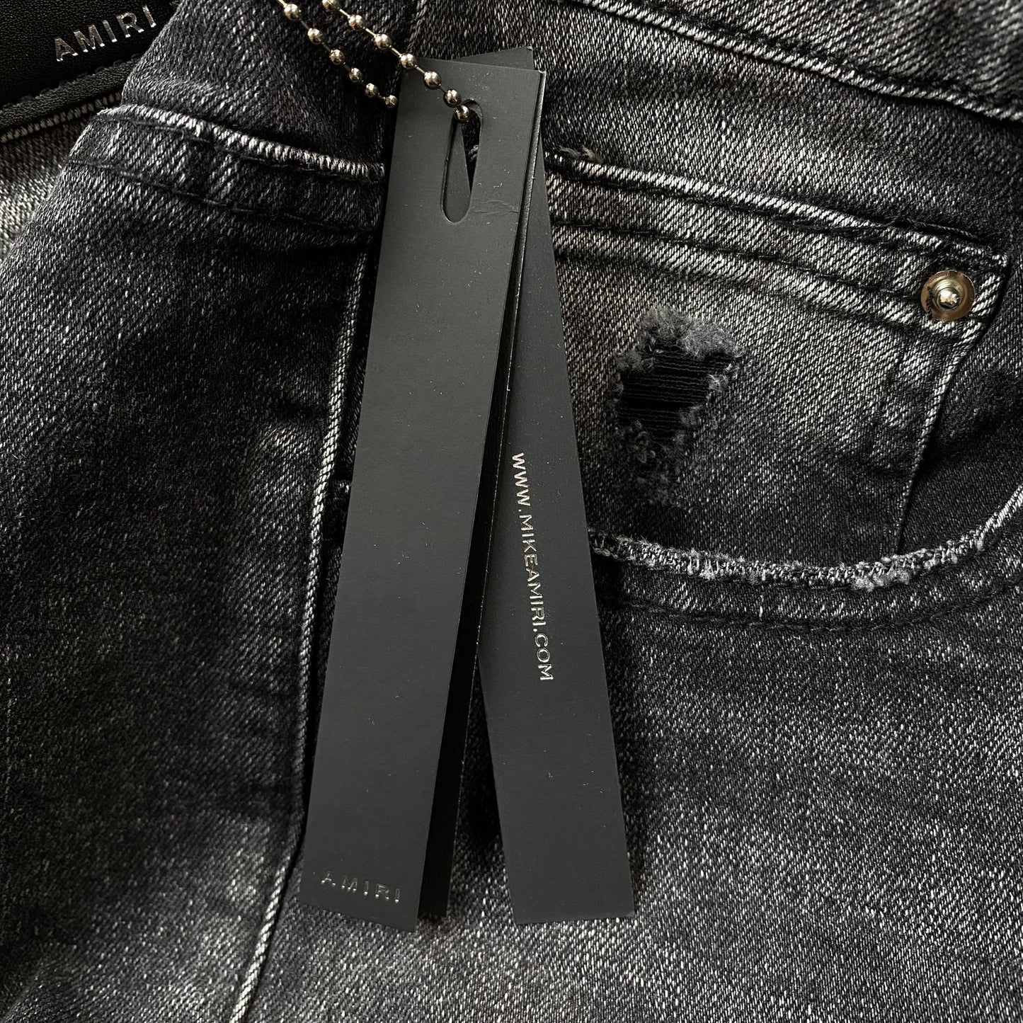 JEAN NOIR AMIRI VARSITY