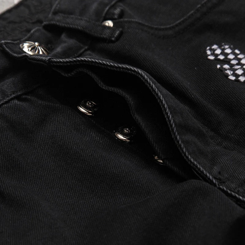 JEAN FLEURKNEE NOIR AVEC PATCH CHROME HEARTS ROSE ET CROSS À CARREAUX