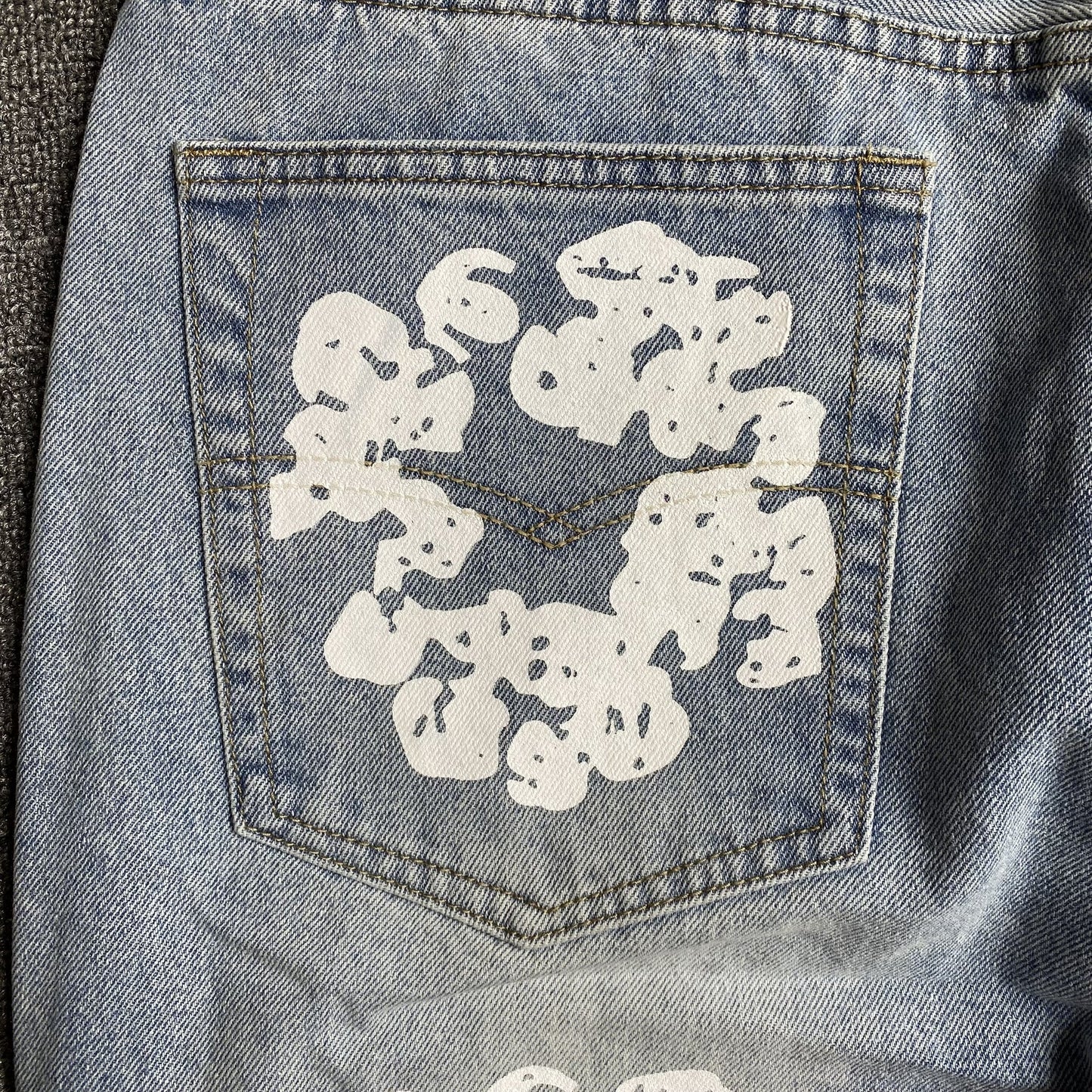 Jean Denim Tears x Levi's délavé clair