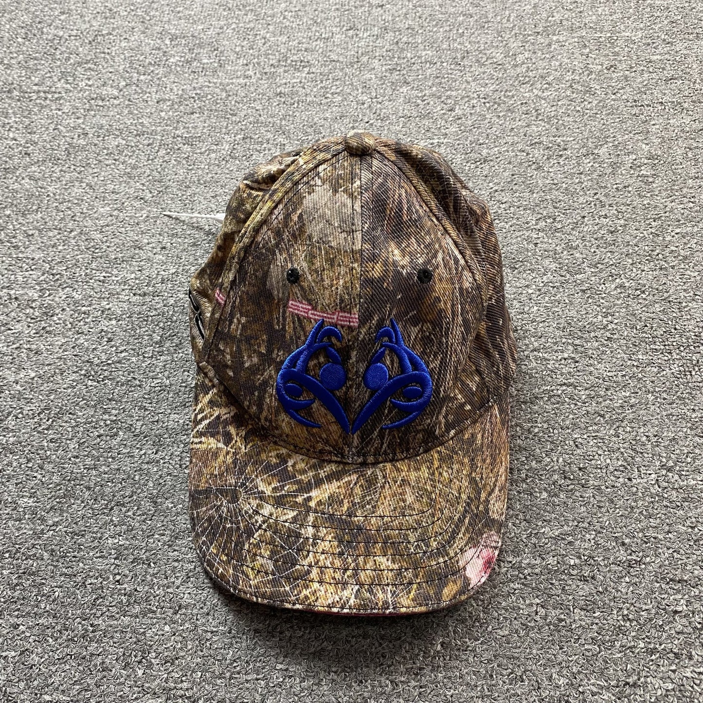 Casquette SP5DER avec logo bleu et camouflage Real Tree
