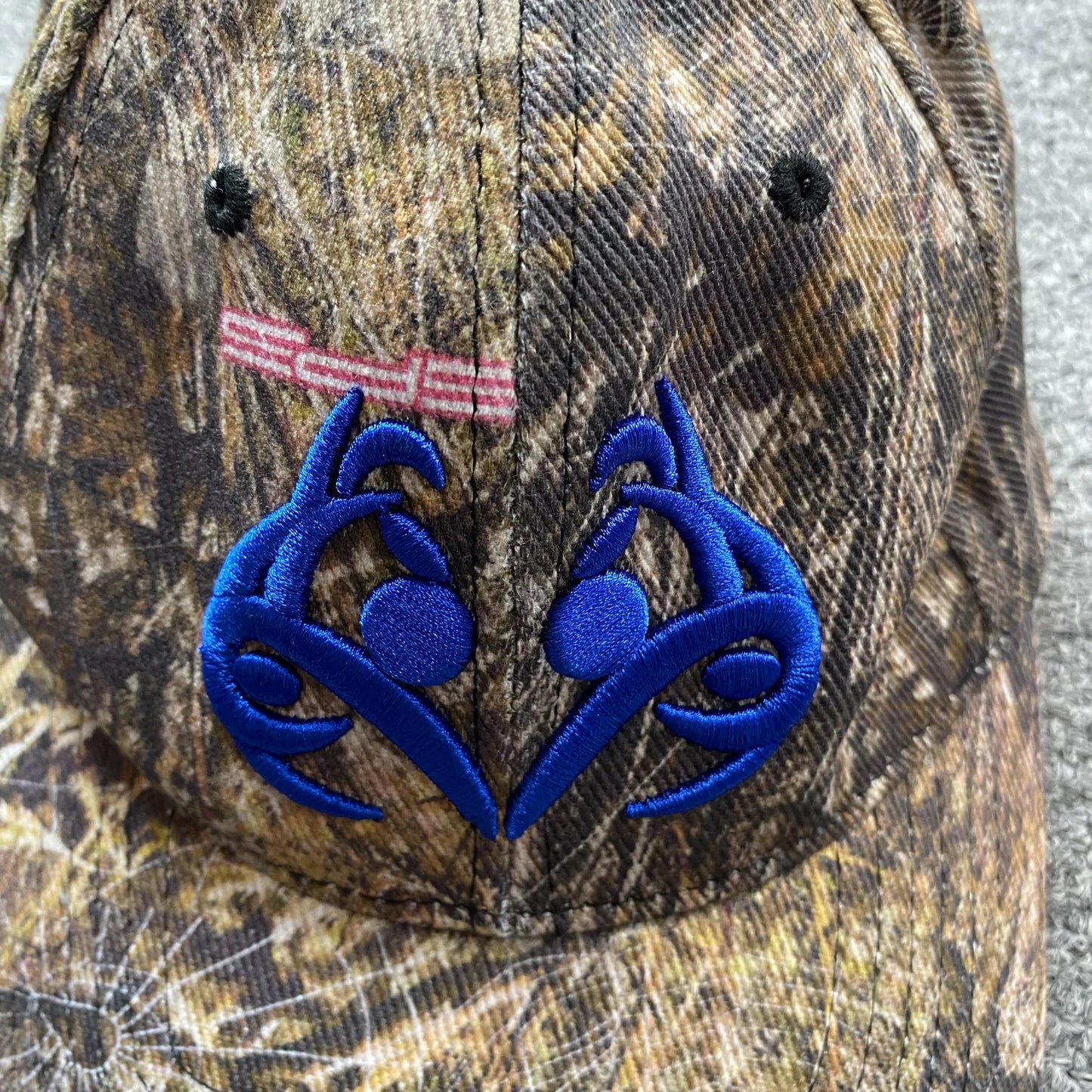 Casquette SP5DER avec logo bleu et camouflage Real Tree