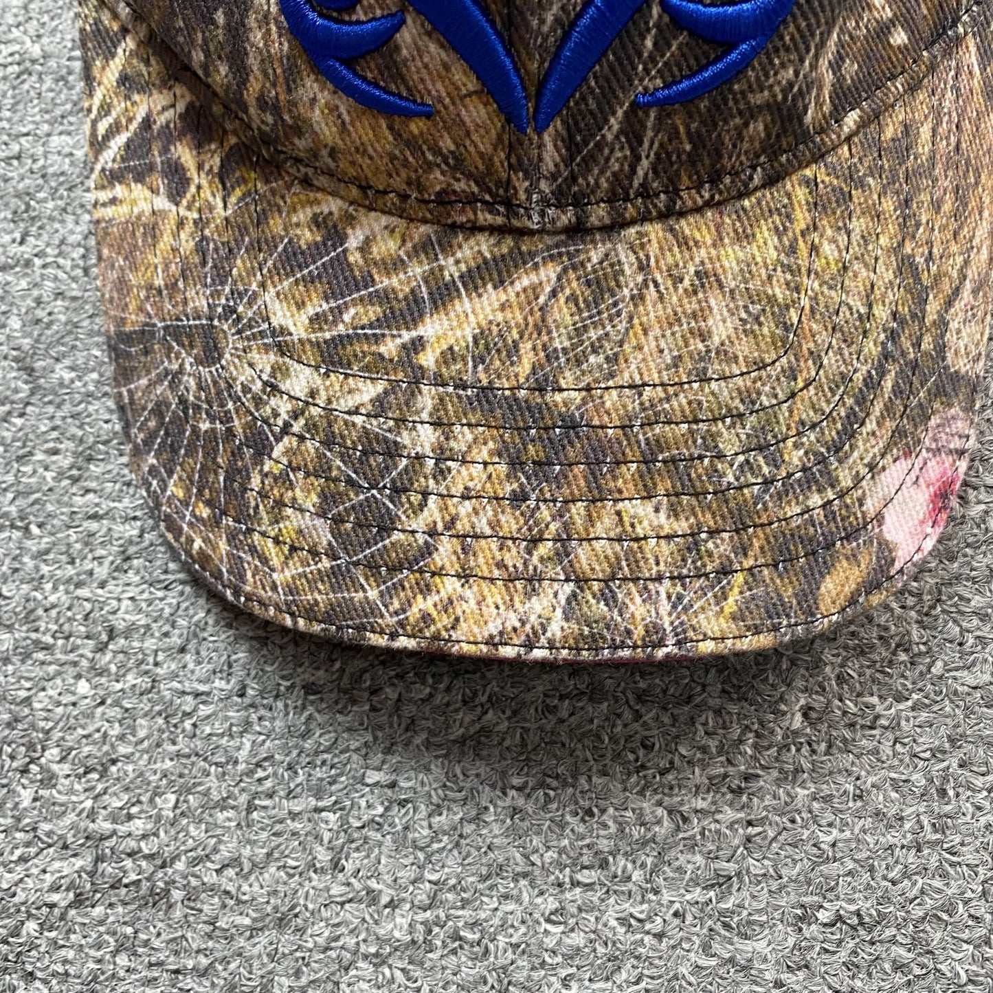 Casquette SP5DER avec logo bleu et camouflage Real Tree