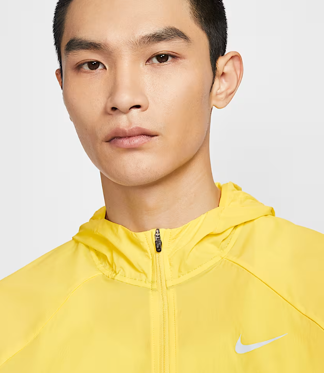 VESTE NIKE IMPERMEABLE JAUNE