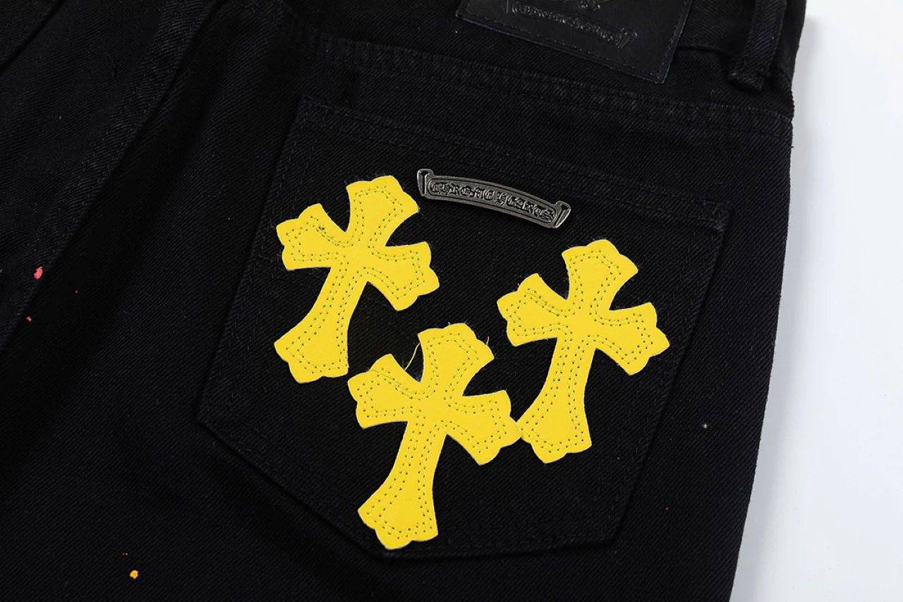 CHROME HEARTS PEINTURE GOUTTE JAUNE CROIX PATCH JEANS NOIR