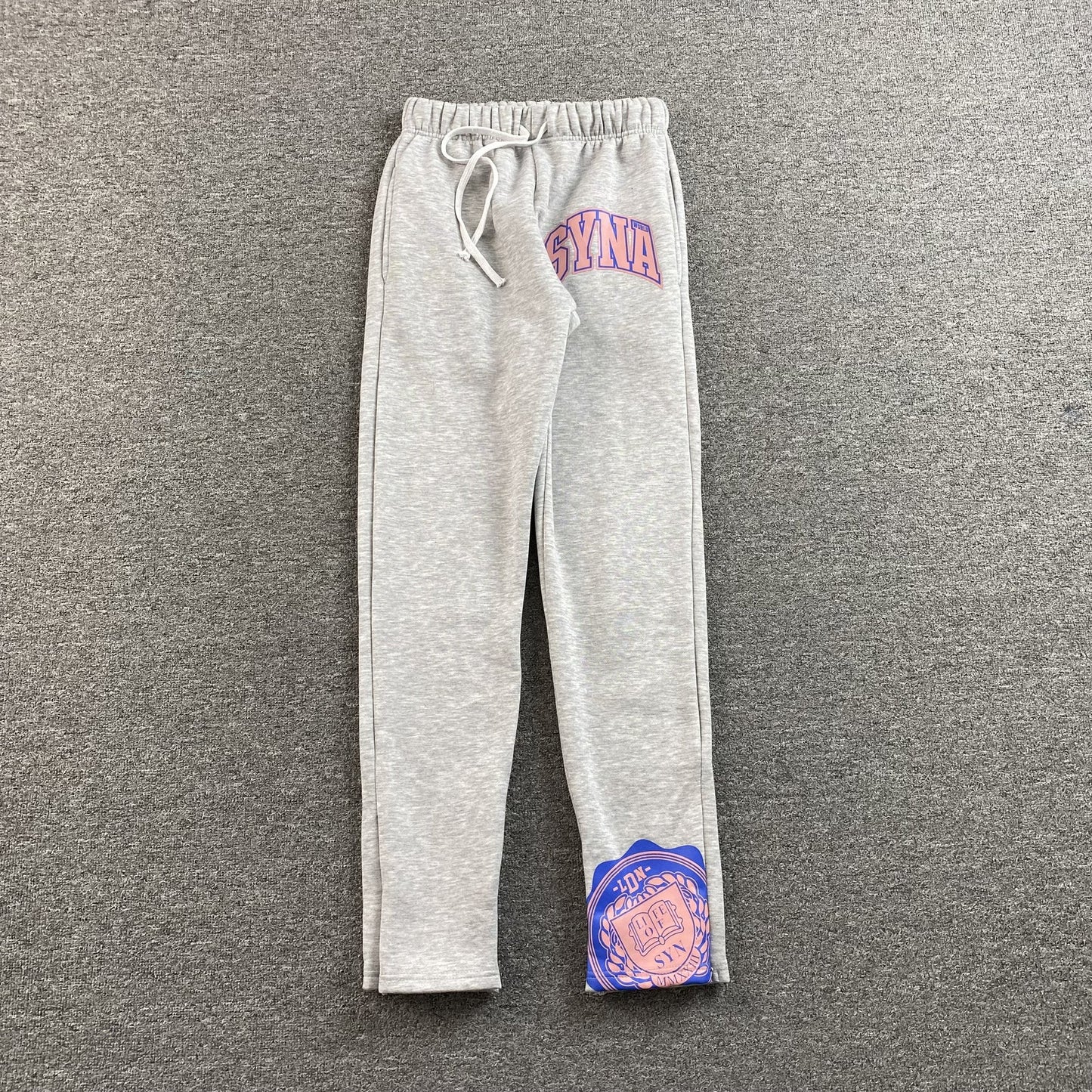 PANTALON DE SURVÊTEMENT SYNA WORLD COLLEGE GRIS