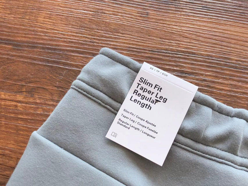 PANTALON NIKE TECH FLEECE x GRIS/BLANC