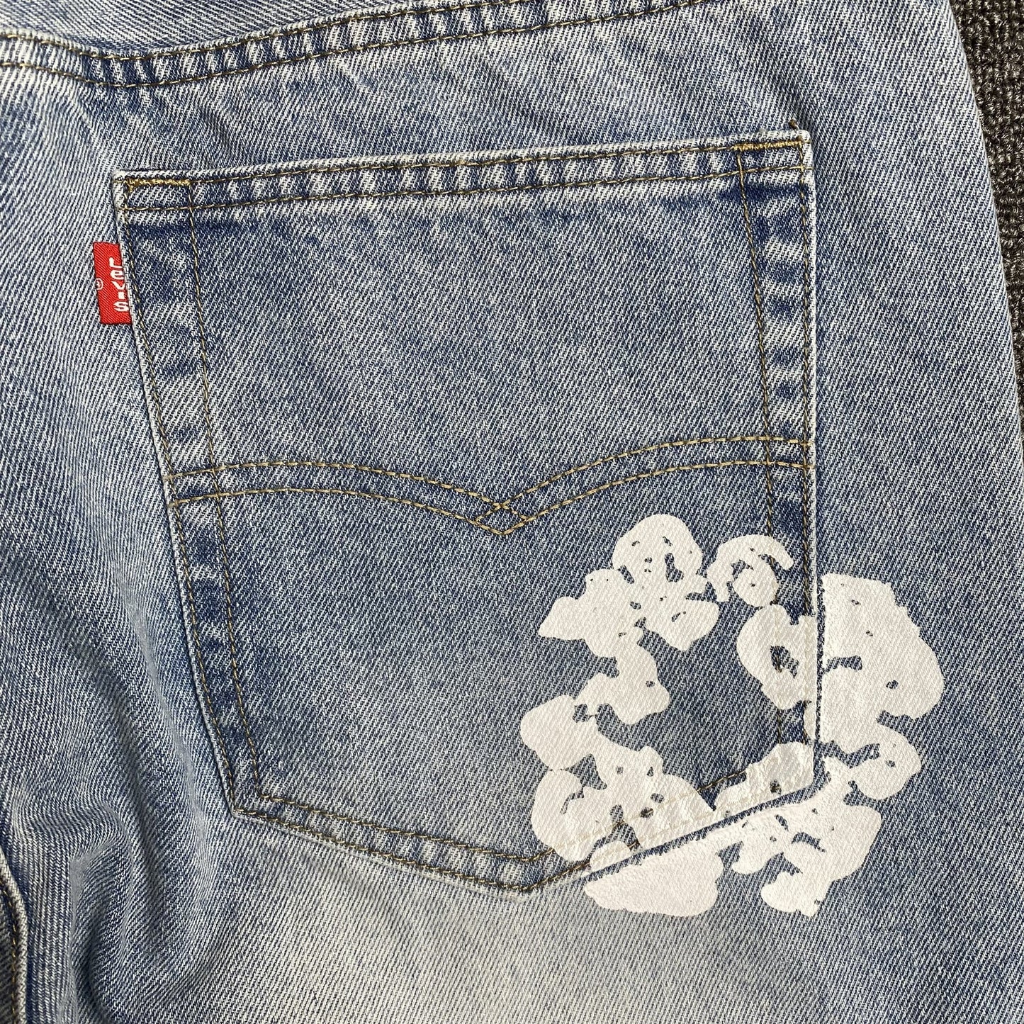 Jean Denim Tears x Levi's délavé clair
