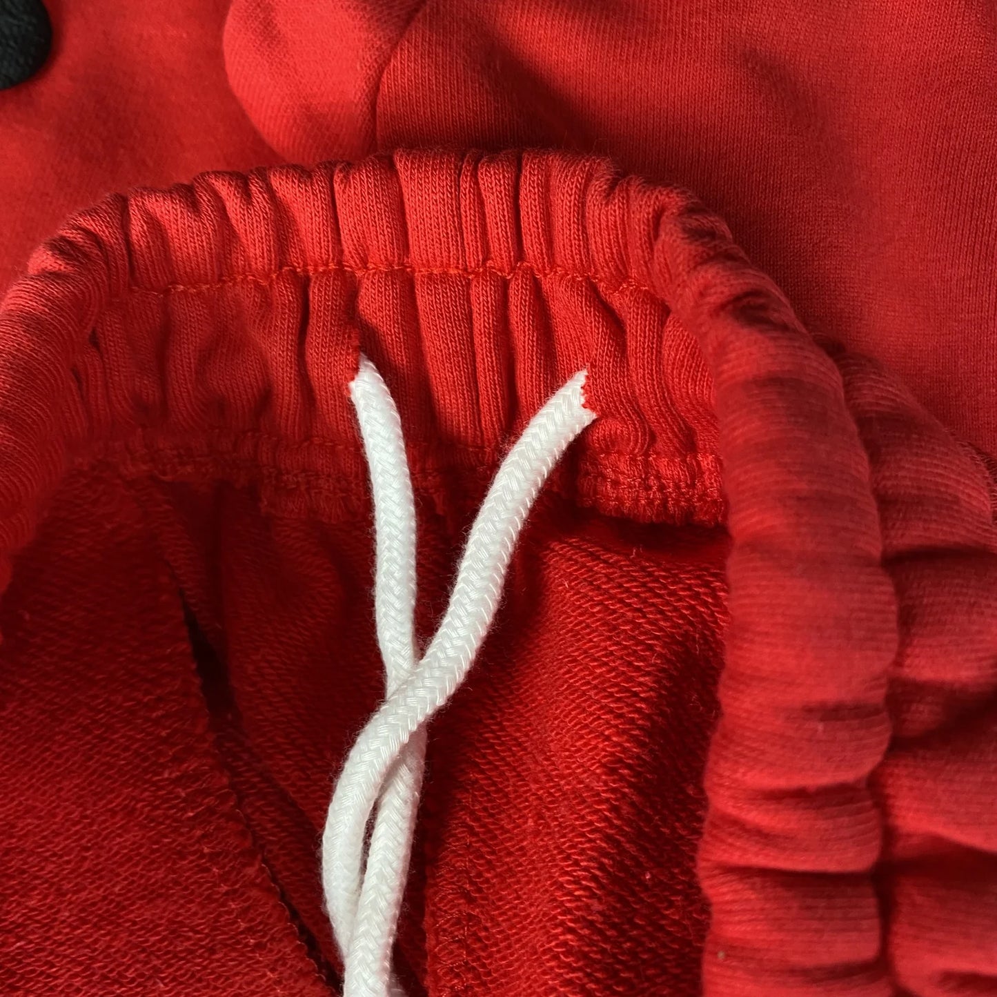 PANTALON DE SURVÊTEMENT SP5DER BELUGA ROUGE