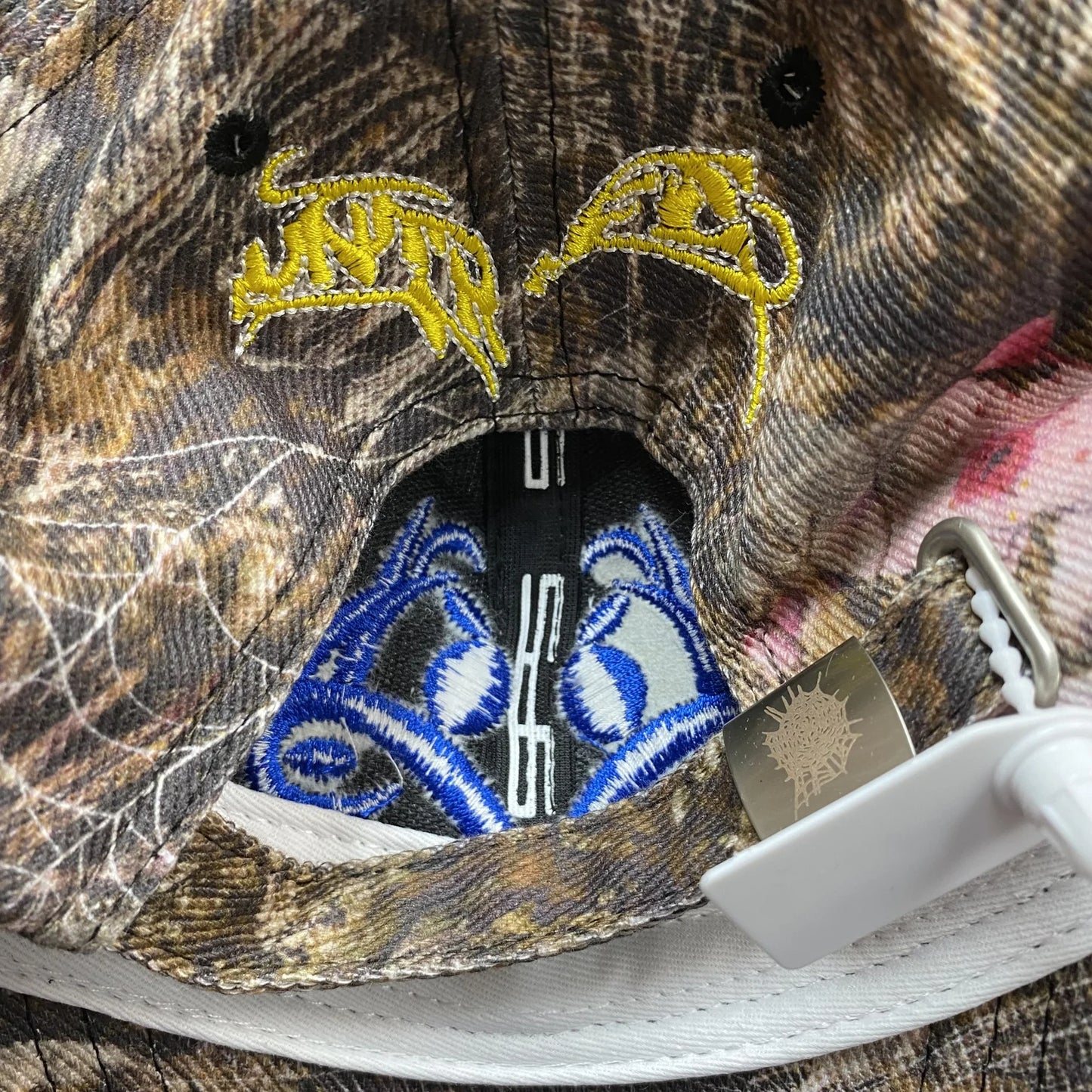 Casquette SP5DER avec logo bleu et camouflage Real Tree