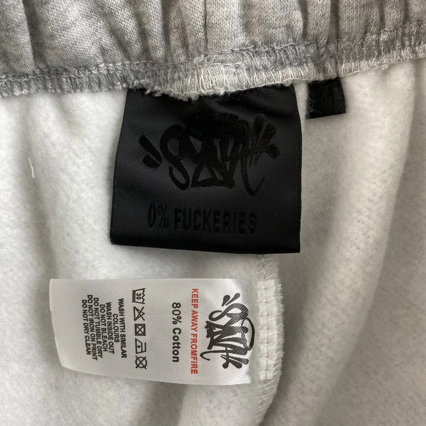 PANTALON DE SURVÊTEMENT SYNA WORLD COLLEGE GRIS