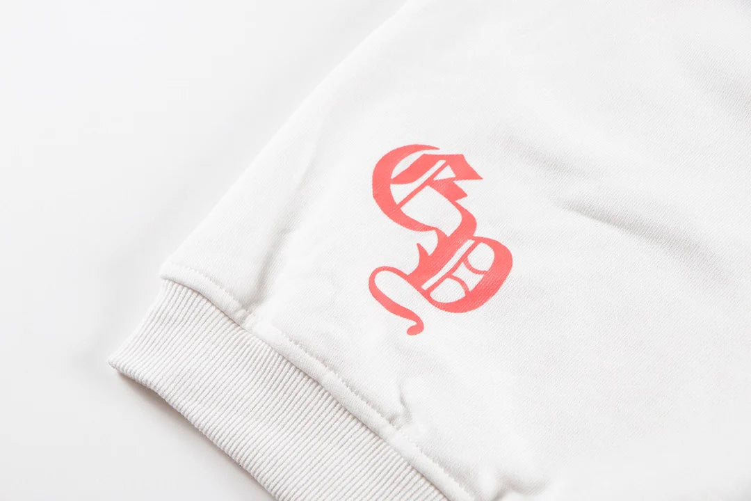 Sweat-shirt blanc avec logo fer à cheval rouge et cœurs chromés