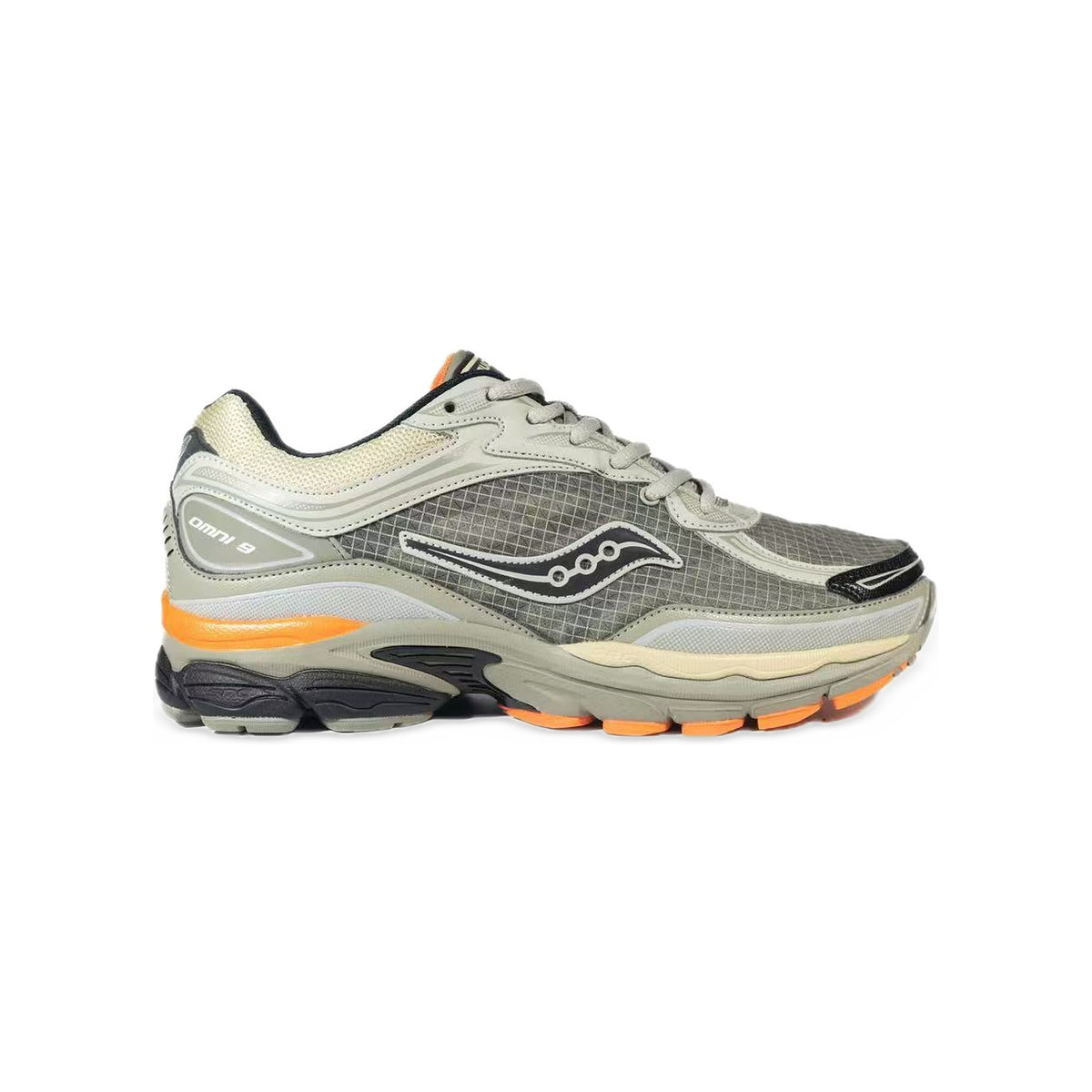 Saucony ProGrid Omni 9 Gris / Orange – vue latérale